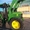 77.Компания Harvesto продает фронтальный погрузчик  John Deere  #1163751